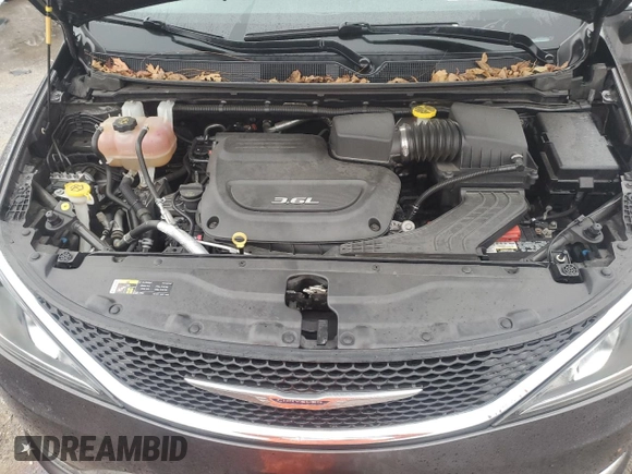 2017 Chrysler Pacifica Touring L with VIN 2C4RC1BG4HR810277, listed as a Copart auction lot 77885014 with 101,492 mi miles and Salvage Title. Bid and sale history available at DreamBid. Image 13.