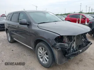 2014 Dodge Durango SXT with VIN 1C4RDHAG5EC560348, listed as a IAAI auction lot 42131010 with 141,315 mi miles and . Bid and sale history available at DreamBid. Image 1.