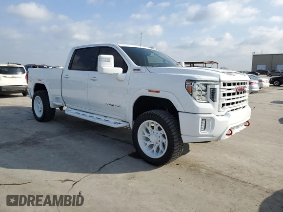 2021 GMC Sierra 2500HD AT4 z VIN 1GT49PEY6MF277074, wystawiony jako Copart lot #49231105 z przebiegiem 77 454 mil mil oraz Czysty tytuł • Clean title. Historia ofert i sprzedaży dostępna na DreamBid. Obrazek 4.