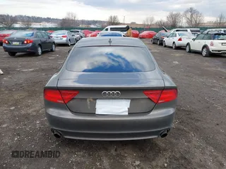 2013 Audi A7 3.0 Premium Plus with VIN WAUYGAFC5DN077054, listed as a IAAI auction lot 41298537 with 150,679 mi miles. Bid and sale history available at carsss.com. Image 16.