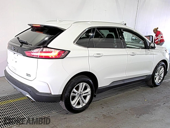 2019 Ford Edge SEL with VIN 2FMPK3J9XKBC37759, listed as a IAAI auction lot 42666643 with 103,812 mi miles and . Bid and sale history available at DreamBid. Image 6.