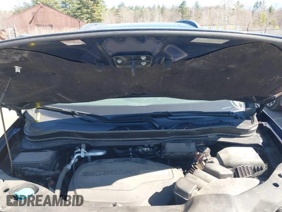 2017 Honda Pilot Touring with VIN 5FNYF6H98HB020341, listed as a IAAI auction lot 42037156 with 73,511 mi miles and . Bid and sale history available at DreamBid. Image 10.