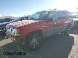 1997 Jeep Grand Cherokee Laredo with VIN 1J4GZ58S1VC760400, listed as a Copart auction lot 43932815 with 108,112 mi miles and Salvage Title. Bid and sale history available at carsss.com. Image 1.