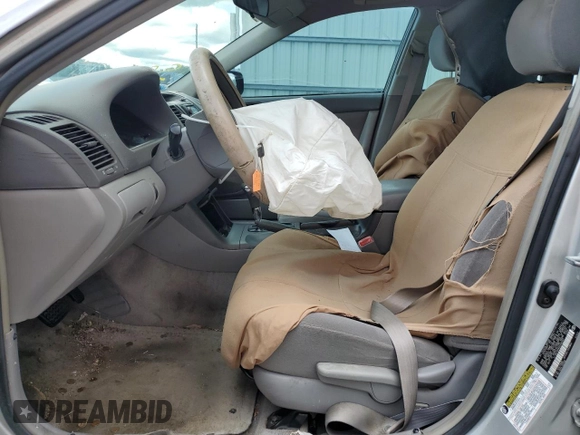 2005 Toyota Camry STD z VIN 4T1BE32K85U386267, wystawiony jako Copart lot #59219615 z przebiegiem 171 844 mil mil oraz Szkoda całkowita • Salvage title. Historia ofert i sprzedaży dostępna na DreamBid. Obrazek 7.