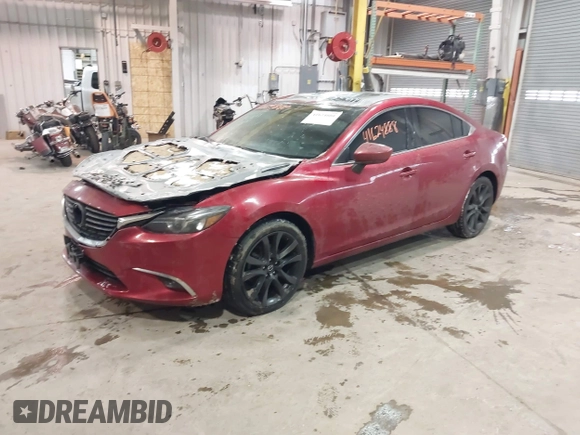 2016 Mazda Mazda6 i Grand Touring with VIN JM1GJ1W54G1432681, listed as a IAAI auction lot 41624888 with 100,410 mi miles. Bid and sale history available at carsss.com. Image 17.