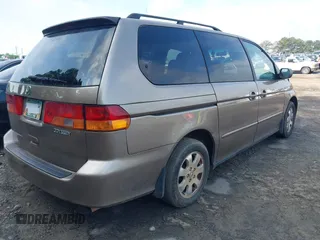 2003 Honda Odyssey EX-L z VIN 5FNRL18073B104192, wystawiony jako IAAI lot #42167068 z przebiegiem 346 764 mil mil oraz . Historia ofert i sprzedaży dostępna na DreamBid. Obrazek 4.