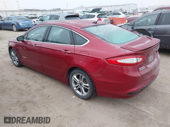 2016 Ford Fusion Titanium Hybrid with VIN 3FA6P0RU3GR355398, listed as a IAAI auction lot 41140669 with 125,959 mi miles. Bid and sale history available at carsss.com. Image 3.