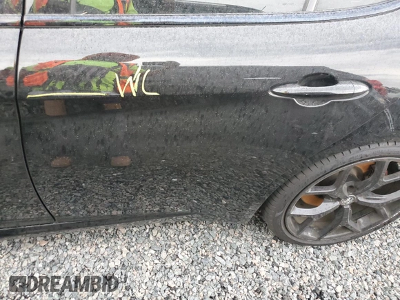 2019 Alfa Romeo Giulia z VIN ZARFAMAN4K7622772, wystawiony jako Copart lot #55380795 z przebiegiem Nie podano mil oraz Szkody całkowita. Historia ofert i sprzedaży dostępna na DreamBid. Obrazek 12.
