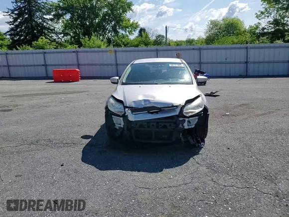 2012 Ford Focus SE z VIN 1FAHP3K20CL219046, wystawiony jako Copart lot #58771285 z przebiegiem 167 703 mil mil oraz Szkoda całkowita • Salvage title. Historia ofert i sprzedaży dostępna na DreamBid. Obrazek 13.