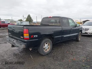 2004 GMC Sierra 1500 SLT with VIN 1GTEK19T74E400259, listed as a IAAI auction lot 41091044 with 173,726 mi miles. Bid and sale history available at carsss.com. Image 4.