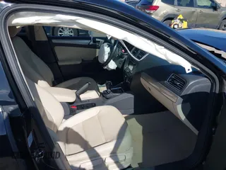 2015 Volkswagen Jetta Sedan 1.8T SE w/Connectivity with VIN 3VWD07AJ6FM354397, listed as a IAAI auction lot 41772983 with 100,265 mi miles. Bid and sale history available at carsss.com. Image 5.