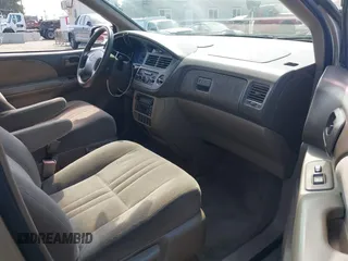 2003 Toyota Sienna CE with VIN 4T3ZF19C53U539951, listed as a IAAI auction lot 41906505 with 233,426 mi miles. Bid and sale history available at carsss.com. Image 5.
