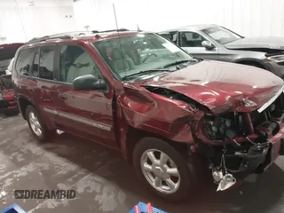 2005 GMC Envoy SLT with VIN 1GKDT13S752214687, listed as a IAAI auction lot 41421248 with 145,388 mi miles. Bid and sale history available at carsss.com. Image 1.