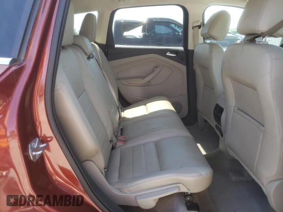 2015 Ford Escape Titanium z VIN 1FMCU0J93FUA66179, wystawiony jako Copart lot #61956325 z przebiegiem 82 889 mil mil oraz Szkoda całkowita • Salvage title. Historia ofert i sprzedaży dostępna na DreamBid. Obrazek 11.