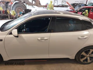 2018 Kia Optima SX with VIN 5XXGW4L27JG237960, listed as a IAAI auction lot 41956461 with 87,085 mi miles and . Bid and sale history available at DreamBid. Image 14.