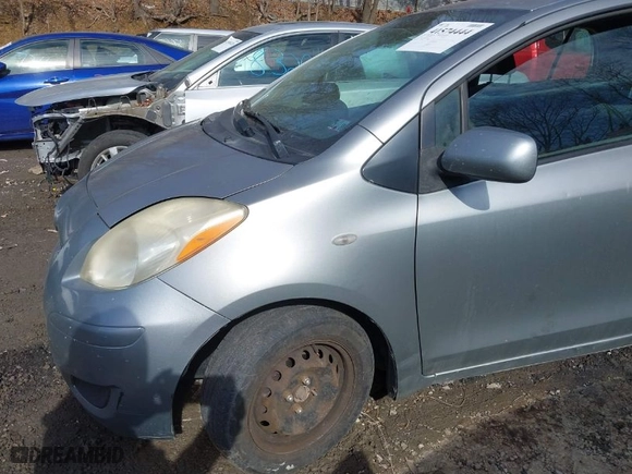 2010 Toyota Yaris with VIN JTDKT4K33A5293606, listed as a IAAI auction lot 41574444 with 262,584 mi miles. Bid and sale history available at carsss.com. Image 15.