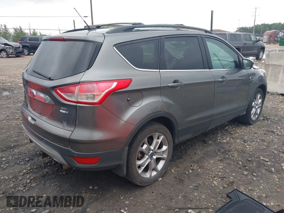 2013 Ford Escape SEL with VIN 1FMCU9HX4DUC75565, listed as a IAAI auction lot 42574351 with 180,876 mi miles and . Bid and sale history available at DreamBid. Image 4.
