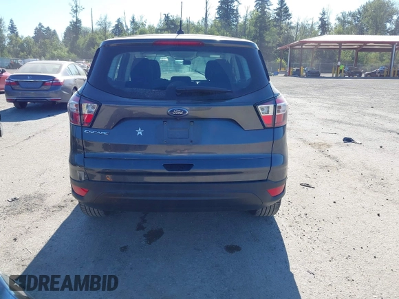 2018 Ford Escape S with VIN 1FMCU0F75JUD05716, listed as a IAAI auction lot 42733113 with 69,469 mi miles and . Bid and sale history available at DreamBid. Image 17.