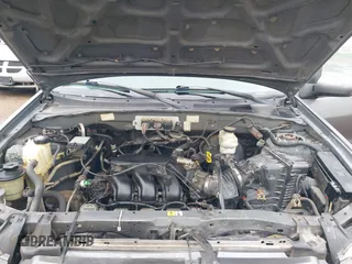2005 Mazda Tribute S with VIN 4F2YZ04135KM05678, listed as a IAAI auction lot 42194083 with 283,488 mi miles and . Bid and sale history available at carsss.com. Image 10.