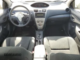 2010 Toyota Yaris with VIN JTDBT4K35A1355708, listed as a Copart auction lot 54347695 with 103,689 mi miles and Salvage Title. Bid and sale history available at carsss.com. Image 8.