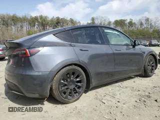 2022 Tesla Model Y Long Range with VIN 7SAYGDEE5NF366493, listed as a Copart auction lot 49874975 with 66,925 mi miles and Salvage Title. Bid and sale history available at DreamBid. Image 3.