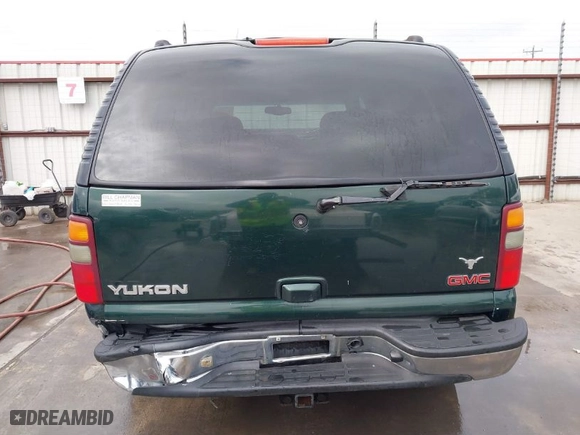 2002 GMC Yukon SLT with VIN 1GKEC13Z52R174419, listed as a IAAI auction lot 41724923 with 309,700 mi miles. Bid and sale history available at carsss.com. Image 6.