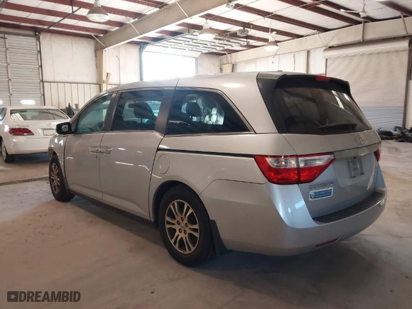 2012 Honda Odyssey EX-L with VIN 5FNRL5H61CB147311, listed as a IAAI auction lot 41607643 with 244,575 mi miles. Bid and sale history available at carsss.com. Image 3.