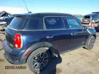 2011 MINI Countryman S with VIN WMWZC5C54BWL55124, listed as a IAAI auction lot 41666874 with 197,656 mi miles and . Bid and sale history available at DreamBid. Image 4.