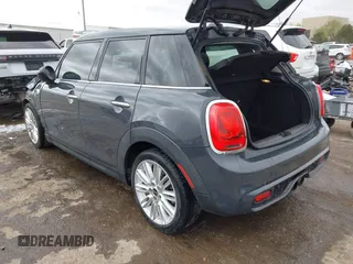 2017 MINI Hardtop 4 Door Cooper S z VIN WMWXU3C3XH2F49201, wystawiony jako IAAI lot #41837027 z przebiegiem 75 949 mil mil oraz . Historia ofert i sprzedaży dostępna na DreamBid. Obrazek 3.