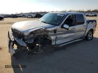 2010 Ford Explorer Sport Trac Limited с VIN 1FMEU3D89AUF08307, выставлен на аукционе Copart как лот 87202434 с пробегом 145 853 миль миль и Списание • Salvage title. История ставок и продаж доступна на DreamBid. Изображение 1.