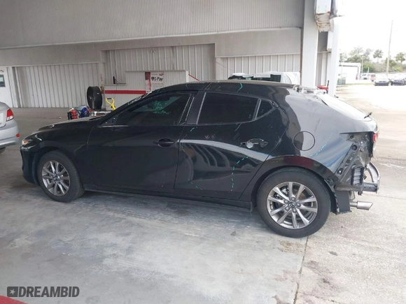 2021 Mazda Mazda3 Hatchback 2.5 S with VIN JM1BPAJL5M1338061, listed as a IAAI auction lot 40765593 with 52,958 mi miles. Bid and sale history available at carsss.com. Image 15.