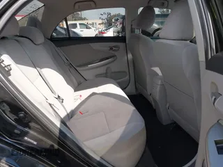 2011 Toyota Corolla L with VIN JTDBU4EE0B9154747, listed as a IAAI auction lot 42028887 with 141,569 mi miles. Bid and sale history available at carsss.com. Image 8.