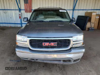 2001 GMC Yukon SLT z VIN 1GKEK13T21J165558, wystawiony jako Copart lot #52200565 z przebiegiem 291 699 mil mil oraz Szkoda całkowita • Salvage title. Historia ofert i sprzedaży dostępna na DreamBid. Obrazek 5.
