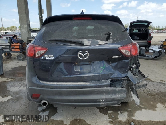2016 Mazda CX-5 Touring with VIN JM3KE2CY9G0834048, listed as a Copart auction lot 54491535 with 116,328 mi miles and Salvage Title. Bid and sale history available at DreamBid. Image 6.