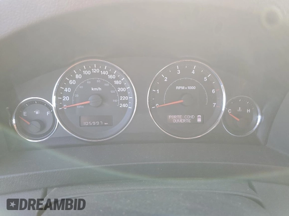 2009 Jeep Grand Cherokee Laredo with VIN 1J8HR48P39C559192, listed as a Copart auction lot 74007094 with 105,997 mi miles and Salvage Title. Bid and sale history available at carsss.com. Image 9.
