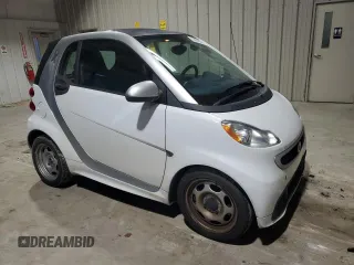 2015 Smart fortwo Passion z VIN WMEEJ3BA5FK814542, wystawiony jako Copart lot #72978714 z przebiegiem 60 081 mil mil oraz Czysty tytuł • Clean title. Historia ofert i sprzedaży dostępna na DreamBid. Obrazek 4.