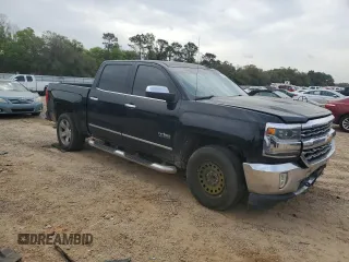 2017 Chevrolet Silverado 1500 LTZ with VIN 3GCPCSECXHG315030, listed as a Copart auction lot 50766385 with 127,349 mi miles and Salvage Title. Bid and sale history available at DreamBid. Image 4.