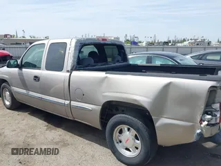 2002 GMC Sierra 1500 SLE with VIN 2GTEC19V821407265, listed as a IAAI auction lot 42087634 with 196,745 mi miles and . Bid and sale history available at DreamBid. Image 14.