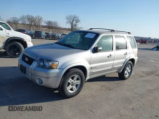 2006 Ford Escape Hybrid with VIN 1FMCU96H96KA25796, listed as a IAAI auction lot 41796914 with 119,809 mi miles and . Bid and sale history available at DreamBid. Image 2.