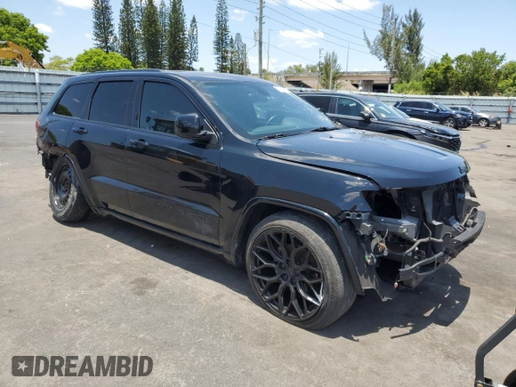 2017 Jeep Grand Cherokee Altitude with VIN 1C4RJEAG3HC952451, listed as a Copart auction lot 55658735 with 92,286 mi miles and Salvage title. Bid and sale history available at DreamBid. Image 4.