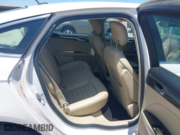 2014 Ford Fusion SE Hybrid with VIN 3FA6P0LUXER233658, listed as a IAAI auction lot 42311588 with 106,282 mi miles and . Bid and sale history available at DreamBid. Image 8.