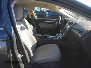 2015 Ford Fusion S Hybrid with VIN 3FA6P0UU7FR117785, listed as a IAAI auction lot 41589546 with 136,657 mi miles. Bid and sale history available at carsss.com. Image 5.