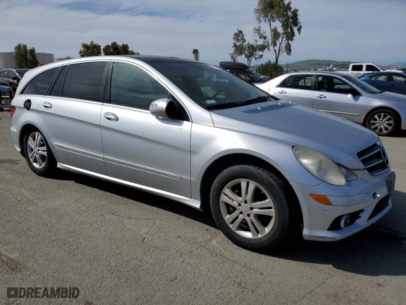 2009 Mercedes-Benz R-Class 3.5L with VIN 4JGCB65E79A091057, listed as a Copart auction lot 52186915 with 99,173 mi miles and Salvage Title. Bid and sale history available at carsss.com. Image 4.