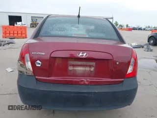 2007 Hyundai Accent GLS with VIN KMHCN46C57U108605, listed as a IAAI auction lot 41932061 with 195,580 mi miles. Bid and sale history available at carsss.com. Image 17.