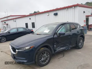 2017 Mazda CX-5 Touring with VIN JM3KFBCL9H0163449, listed as a IAAI auction lot 41919020 with 102,898 mi miles. Bid and sale history available at carsss.com. Image 6.