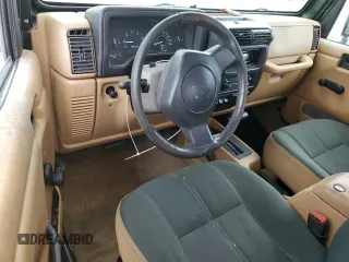 1998 Jeep Wrangler Sahara с VIN 1J4FY49S0WP727745, выставлен на аукционе Copart как лот 60546955 с пробегом 139 476 миль миль и Чистый • Clean title. История ставок и продаж доступна на DreamBid. Изображение 8.