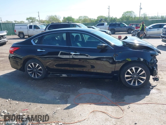 2016 Nissan Altima SR z VIN 1N4AL3AP8GC292164, wystawiony jako IAAI lot #42053545 z przebiegiem 99 743 mil mil oraz . Historia ofert i sprzedaży dostępna na DreamBid. Obrazek 14.