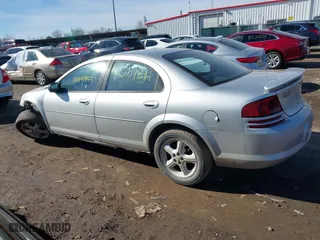 2004 Dodge Stratus SXT with VIN 1B3EL46X64N128617, listed as a IAAI auction lot 41584871 with 140,316 mi miles. Bid and sale history available at carsss.com. Image 14.