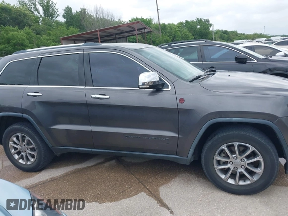 2014 Jeep Grand Cherokee Limited with VIN 1C4RJFBG4EC227165, listed as a IAAI auction lot 42135232 with 105,873 mi miles. Bid and sale history available at carsss.com. Image 13.