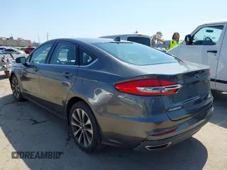 2020 Ford Fusion SE with VIN 3FA6P0T99LR173347, listed as a IAAI auction lot 42090457 with 118,359 mi miles and . Bid and sale history available at DreamBid. Image 3.